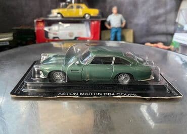 Коллекционная модель Aston Martin DB4 Coupe British racing green lalafo.az -da Коллекционная модель Aston Martin DB4 Coupe British racing green