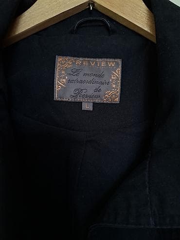 Jiletlər: Qara trenç. Qalın materialı var, kurtka kimidir, külək buraxmır. Əla — 4