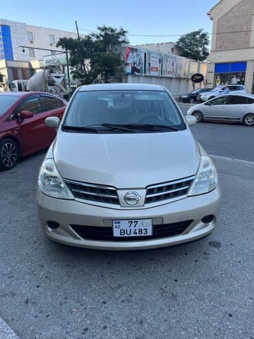 nissan teana 2000: Nissan Tiida, qızılı/bej rəng, hetçbek gövdə. Texniki və dizayn — 7