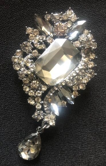 xari bulbul sancaq: Broş tezedi,qara rengde — 1