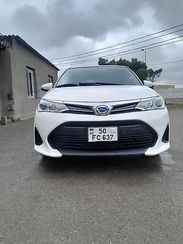 Toyota Corolla Fielder Hybrid – universal kuzovlu, ağ rəng. - Hibrid