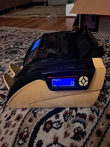 İşlənmiş pul sayan aparat satılır. Model: 5800D UV/MG. Aparat işlək — 2