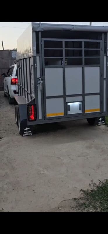 Heyvan daşıma qoşqusu (treyler) - İki oxlu, avtomobilə qoşulan heyvan