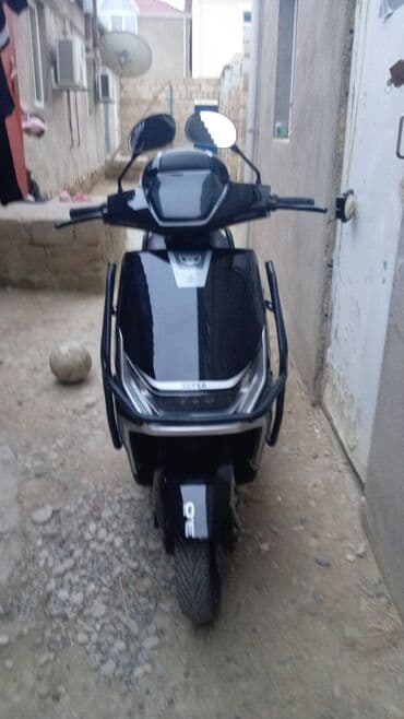 Kvadrosikllar: Elektrik skuter – şəhər içi rahat və səssiz hərəkət üçün. Elektron 50 — 2