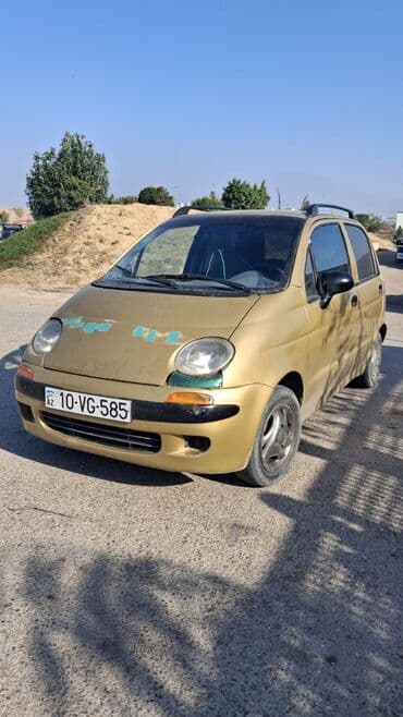 faizsiz kreditlə maşın: Daewoo Matiz, qızılı rəng, 5 qapılı şəhər avtomobili. Xüsusiyyətlər — 6