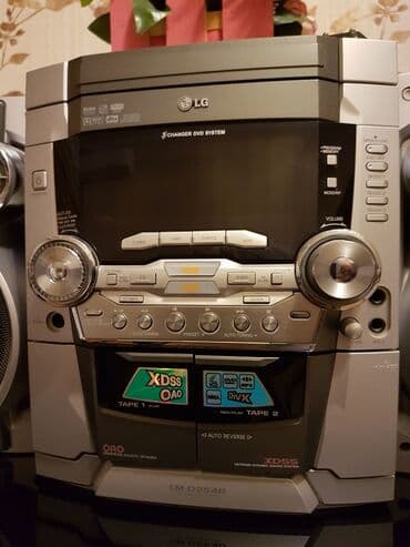 Avtoelektronika: 3 DVD changer musiqi mərkəzi. Hər bir funksiyası işlək vəziyyətdədir — 2