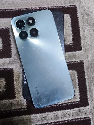 telefon ucun kabro: Honor X6a, 128 GB, rəng - Göy, Face ID — 2