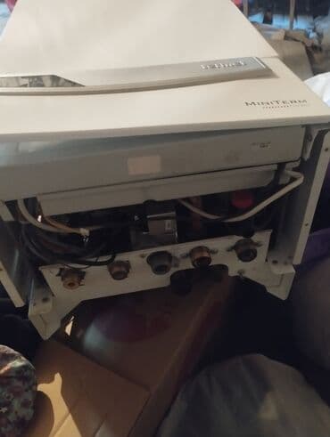 neoterm kombi 24: Demirdöküm Miniterm modeli qazan. Divara quraşdırılan bu ağ rəngli — 2