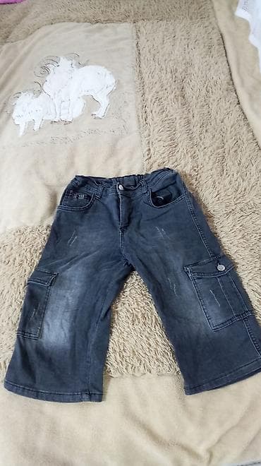 Uşaq üçün tünd-boz rəngli cins şalvar (kapri uzunluqda). - Material lalafo.az -da Uşaq üçün tünd-boz rəngli cins şalvar (kapri uzunluqda). - Material