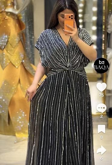 Qara rəngdə, parıltılı zolaq naxışlı, maxi uzunluqda ziyafət/libas. -