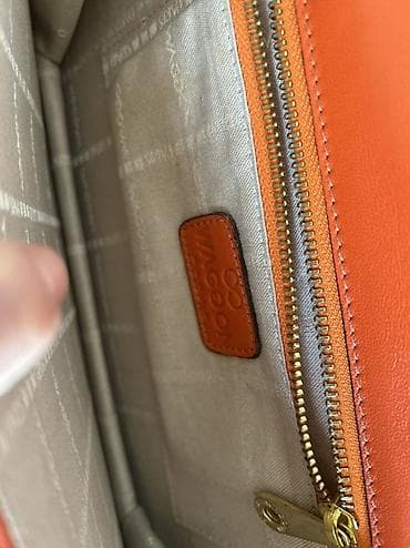 parca canta: Narıncı rəngli zəncirli çiyin çantası.Fransız markası olan Waggon - — 5