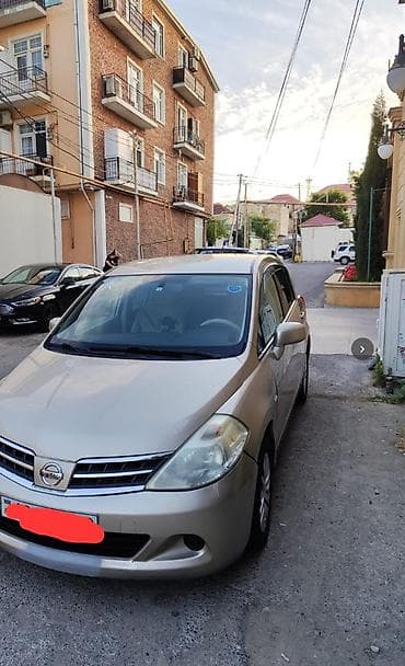 07 disk: Nissan Tiida hatchback 2012,1.5motor,perekitka,gedis 144000 - Korpus — 1