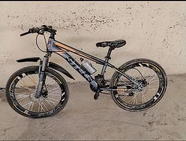 Stels dağ velosipedi - Çərçivə: sloping dizaynlı - Təkərlər: 24"