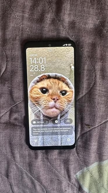 note 30: Xiaomi Redmi smartfon - Model: Redmi (şəkildəki arxa qapaqda “Redmi” — 1