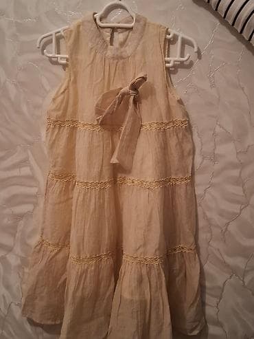 qısa don: Uşaq qız paltarı – krem/bej rəngdə, yüngül və nəfəsalan parça. - — 2