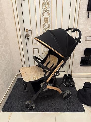 papaqlarin satisi: IrKolyaska satilir Qiymet 85 man Unvan;M.F Axundov kuc 8648 F — 1