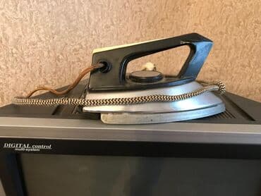 köhnə ütü: Əl buxarlayıcısı — 1