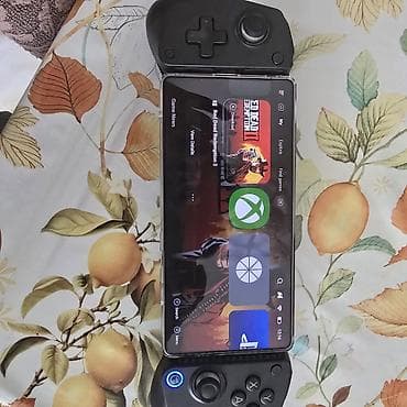 mobil internet modem: Mobil oyun nəzarətçisi – smartfon üçün klipsli gamepad - İki tərəfli — 1