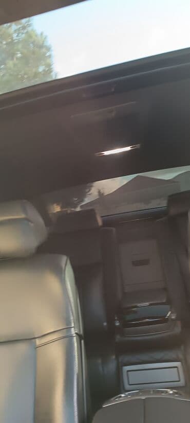 Audi: BMW 7 series: 4.8 л | 2006 г. Седан — 4