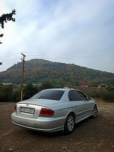 opel vectra c: Hyundai Sonata: 2 l | 2003 il Sedan — 9