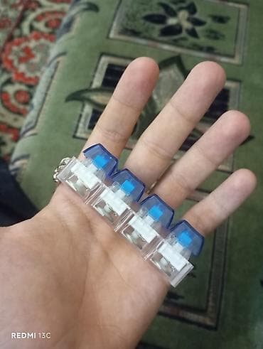 Məhsul: LED işıqlı mini düyməli brelok Təsvir: - 4 ədəd şəffaf