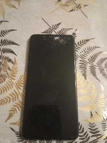 ucuz qaz peci: Xiaomi Mi5, 32 GB, rəng - Qara, 
 Sensor, Barmaq izi, Face ID — 3