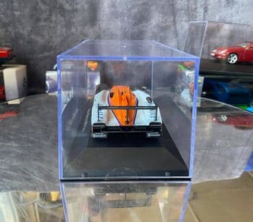 где можно продать марки: Коллекционная модель Aston Martin AMR-One #7 Gulf Team LeMans 2011 — 9
