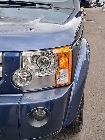 4 qapi niva: Land Rover Discovery 3 – tünd mavi rəng, tam ölçülü SUV. Əsas — 3