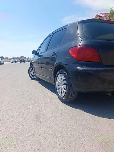 prius duman: Peugeot 307, qara rəng, hetçbek kuzov. Texniki və dizayn — 6