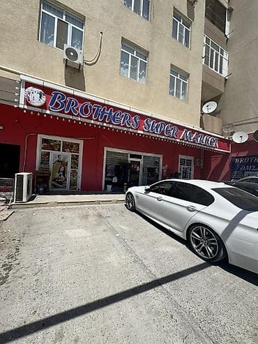 saat vitrini: BROTHERS SUPER MARKET – gündəlik alış-veriş üçün rahat market Salam — 1