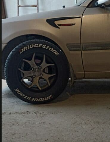 qapi ustu asmalar: Təkər üçün yazilar.Yokohama və Toyo riyers qalıb — 12