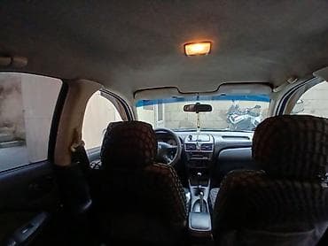 ford focus 2001: Nissan Sunny: 1.3 l | 2007 il Sedan — 6