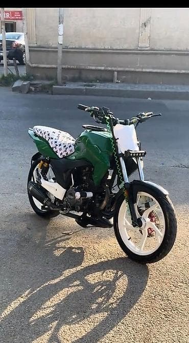 mini cps: Modifikasiya olunmuş şəhər/naked tərzli motosiklet Xüsusiyyətlər: - — 6