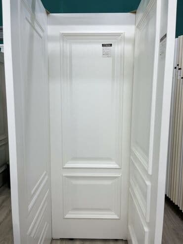 Ağ rəngdə, klassik dizaynlı qapı. Panellər ilə bəzədilmişdir və lalafo.az -da Ağ rəngdə, klassik dizaynlı qapı. Panellər ilə bəzədilmişdir və
