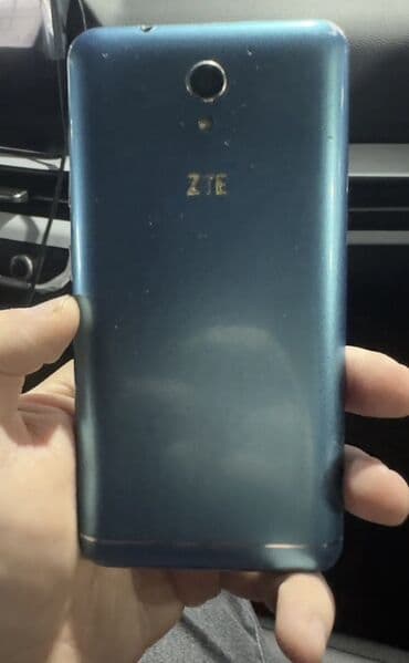 телефон fly с хорошим аккумулятором: ZTE v889m, 512 GB, rəng - Mavi, Sensor — 4