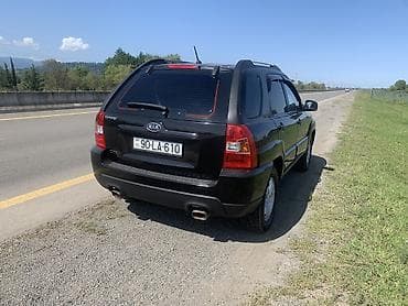 e 3 2: Kia Sportage: 2 l | 2008 il Ofrouder/SUV — 5