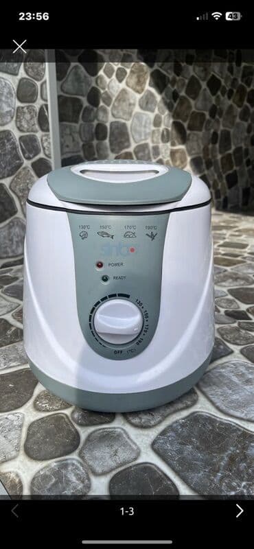 Alfa Romeo: Ağ və boz rənglərdə olan bu yığcam fritöz mətbəxlər üçün praktiki bir — 1