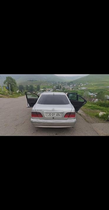 Продажа авто: Mercedes-Benz E-Class sedan (E200 Kompressor emblemli), gümüşü rəng — 3