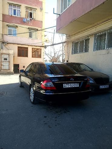 lider disk: Mercedes‑Benz E‑Class (W211) sedan – qara rəng, 4 qapı, 5 yerlik. - — 8