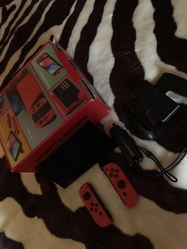 xiaomi tab: Nintendo Switch OLED – Mario Red Edition Xüsusiyyətlər: - 7 düymlük — 1