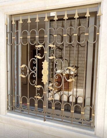 demir yumruq resmi: Dəmir döymə pəncərə barmaqlıqları – dekorativ və təhlükəsiz həll - — 5