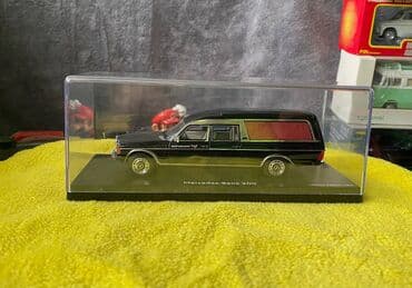 metbex tavan modelleri: Коллекционная модель Mercedes-Benz 200 W123 Hearse black 1982 Schuco — 9