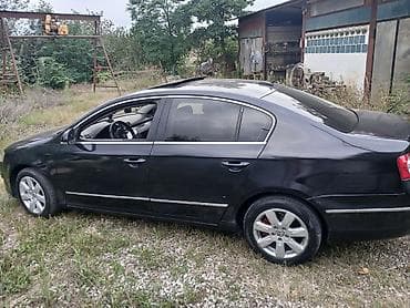 volqa ehtiyat hisseleri: Volkswagen Passat sedan. Avtomobilin salonu qara rəngdədir və ön — 8