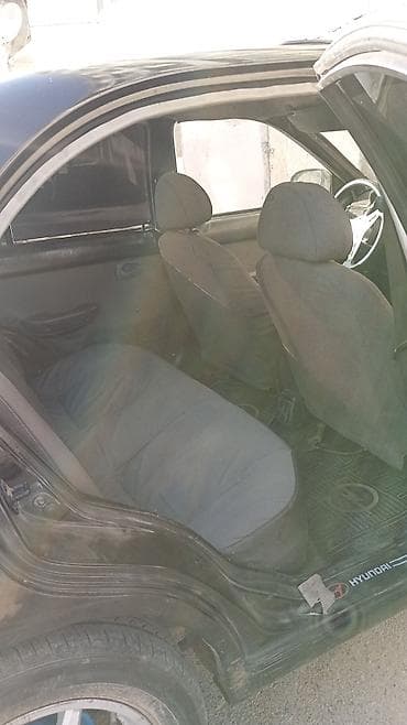 mini kran: Hyundai Accent: 1.5 л | 1994 г. Седан — 4