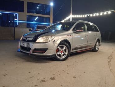 kia ceed 2010: Opel Astra: 1.3 l | 2006 il 295000 km Universal — 2