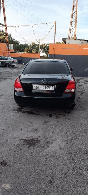 qazel tap.az: Hyundai Elantra, qara rəng, sedan kuzov. Əsas xüsusiyyətlər: - — 3