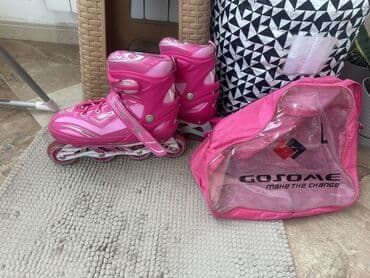 Çəhrayı rəngdə, təkərlərin sürüşməsinə nəzarət edən təkərləri olan