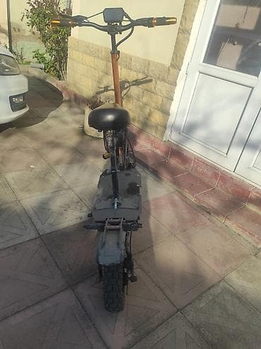 Elektrik skuter – oturacaqlı, qalın dişli təkərli, iri gövdəli model