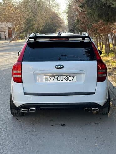 ford masin qiymetleri: Kia Cee’d SW, ağ rəng, universaldır. Şəhər və uzun yol üçün praktik və — 2