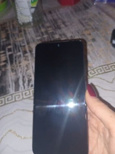 Xiaomi Redmi smartfon - Model: Redmi (arka qapaqda Redmi loqosu və